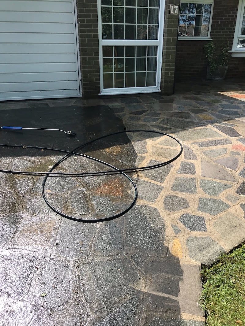 Here you can see a driveway during the cleaning process